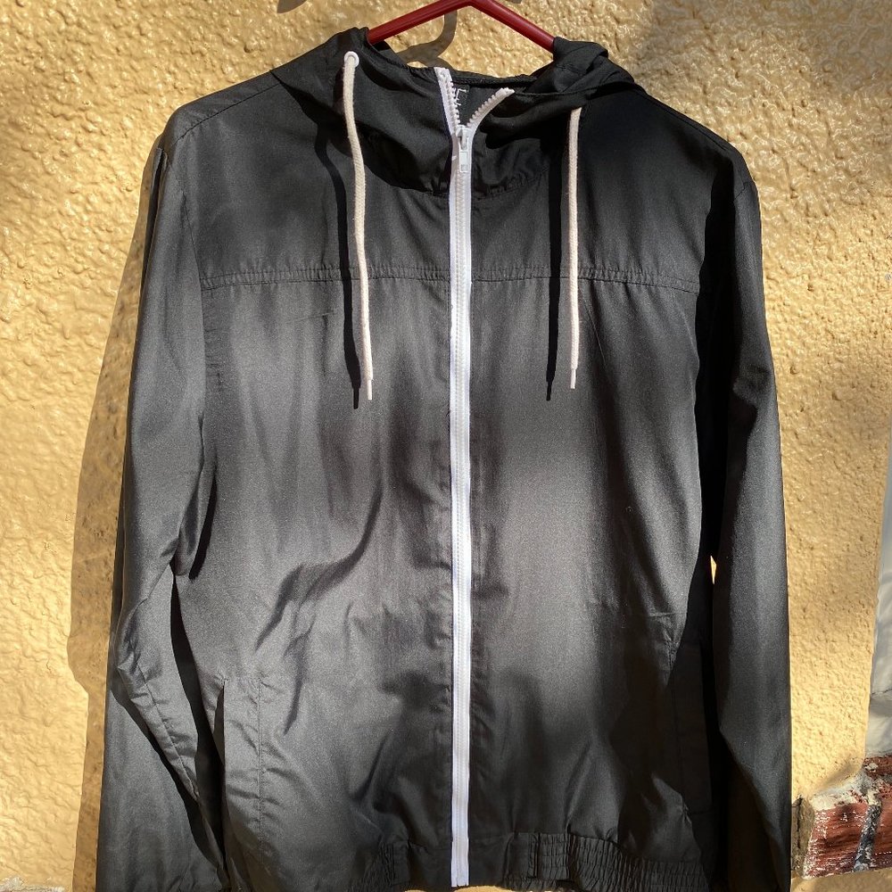 Zine (Zumiez) black windbreaker with hood and white zipper